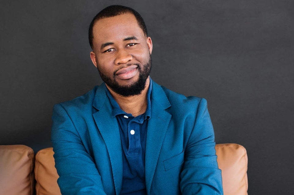 Chigozie Obioma author photo in blue suit